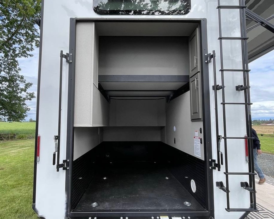 Interior view of garage showing multiple storage levels and organization